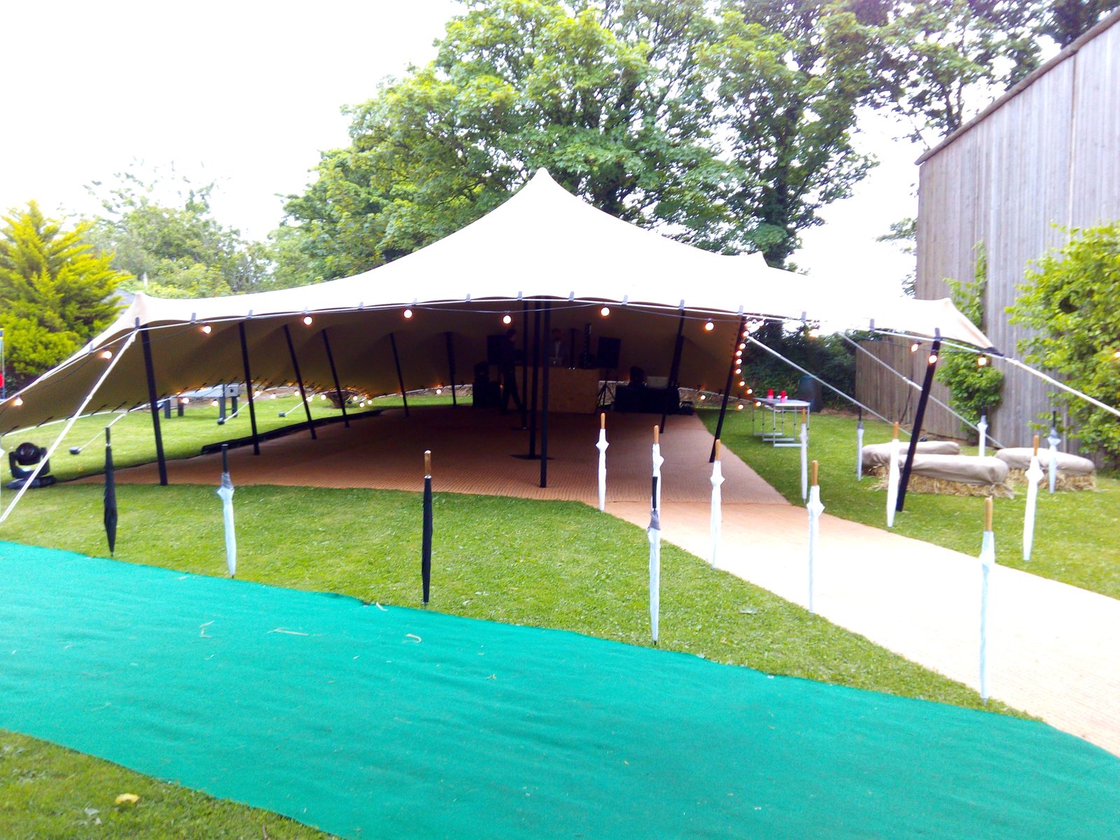 Aerial view of a stretch tent structure at an outdoor event