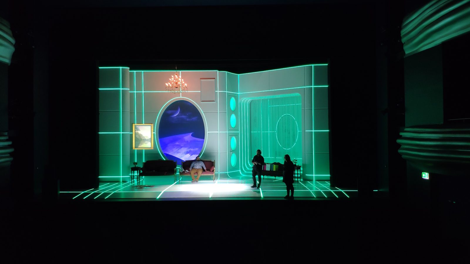 Theatre stage set with illuminated scenic design